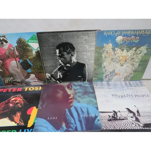 319 - Fifteen Vinyl Rock and Pop LP' Albums by various artists to include, Sade, Barker James Harvest, Ian... 