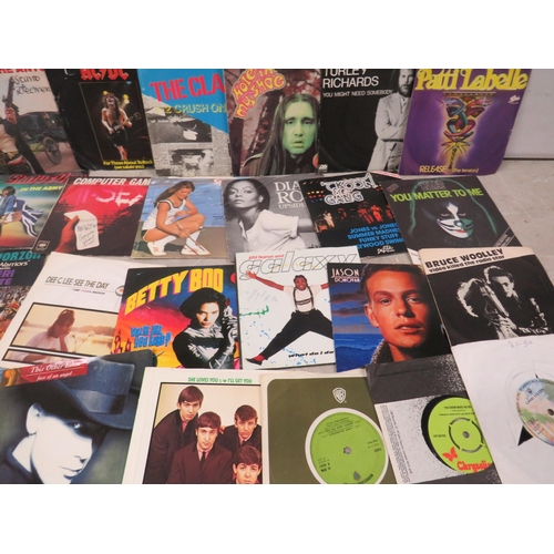 335 - Approx 100+ Vinyl 45's Singles from the 1980's era. See photos