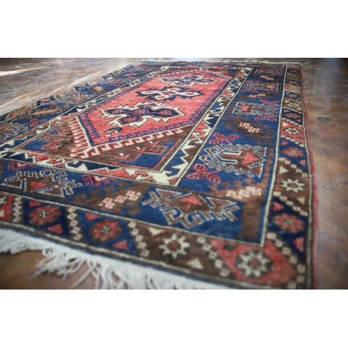 919 - Turkish Made wool rug in very good condition. Measures approx 73 x 47 inches, see photos