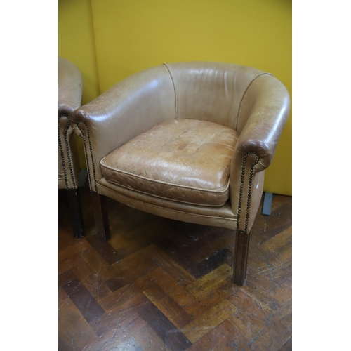 920 - Pair of Leather Tub chairs in light use condition. See photos