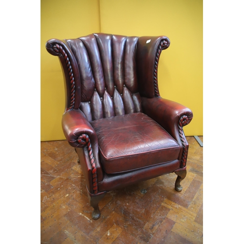 924 - Beautifully Upholstered Leather Chesterfield Wing back Chair in very good condition, see photos