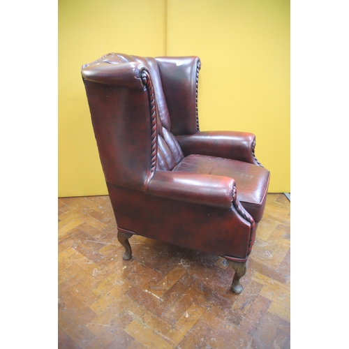 924 - Beautifully Upholstered Leather Chesterfield Wing back Chair in very good condition, see photos