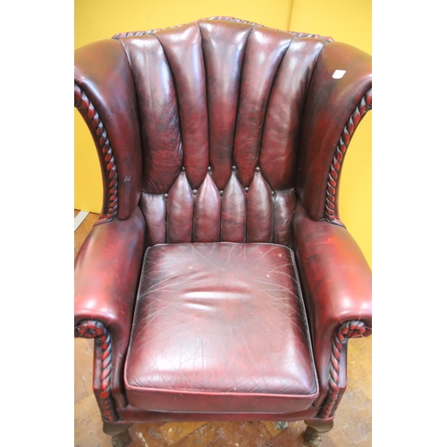 924 - Beautifully Upholstered Leather Chesterfield Wing back Chair in very good condition, see photos