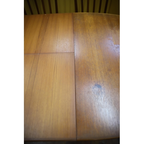 926 - Mid 20th Century, Mc'intosh Teak Extending Dining Table with six chairs ,  Some slight marking to ta... 