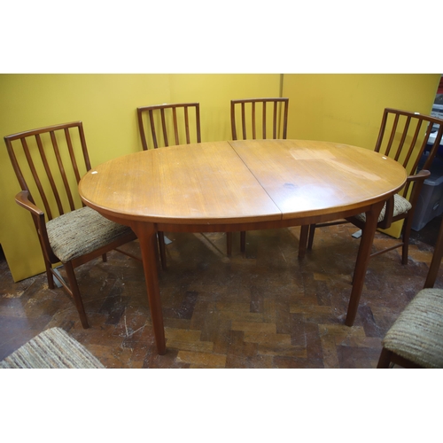 926 - Mid 20th Century, Mc'intosh Teak Extending Dining Table with six chairs ,  Some slight marking to ta... 