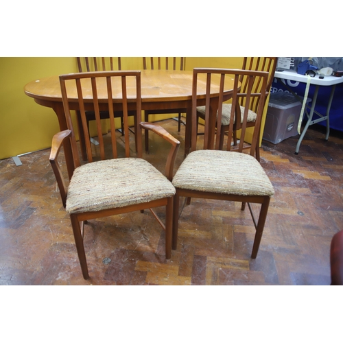 926 - Mid 20th Century, Mc'intosh Teak Extending Dining Table with six chairs ,  Some slight marking to ta... 