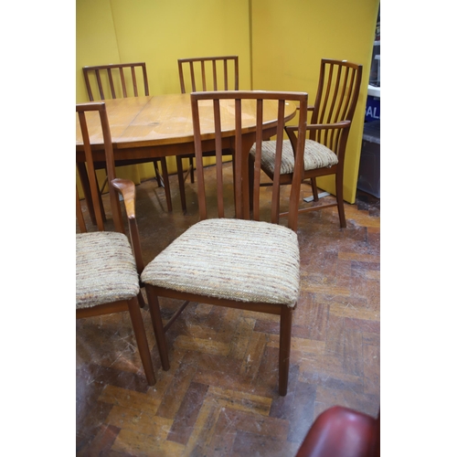 926 - Mid 20th Century, Mc'intosh Teak Extending Dining Table with six chairs ,  Some slight marking to ta... 