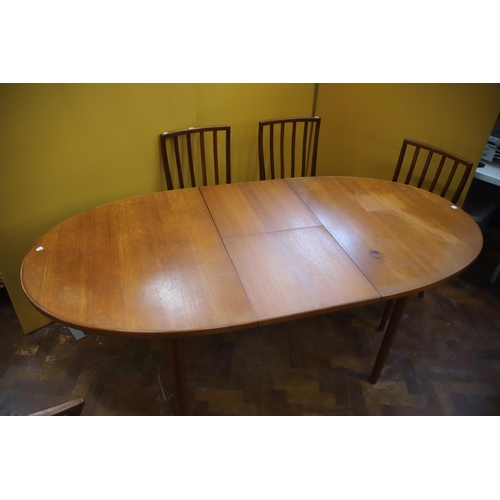 926 - Mid 20th Century, Mc'intosh Teak Extending Dining Table with six chairs ,  Some slight marking to ta... 