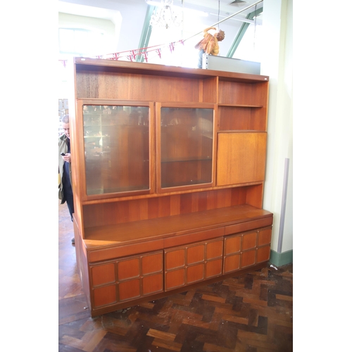 928 - Mid 20th Century Mc'intosh Teak Wall unit with glass top doors  . Comes  in two parts for ease of mo... 