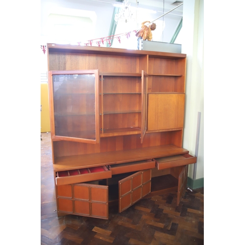 928 - Mid 20th Century Mc'intosh Teak Wall unit with glass top doors  . Comes  in two parts for ease of mo... 