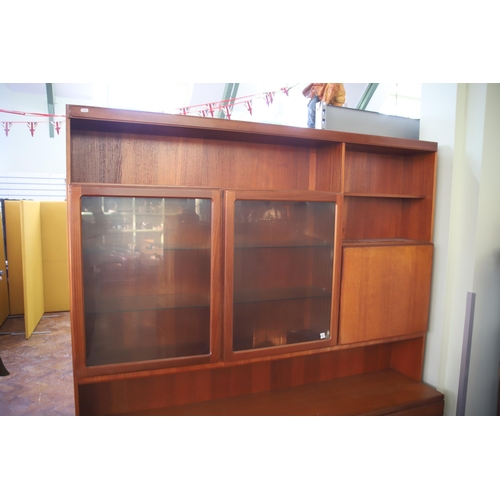 928 - Mid 20th Century Mc'intosh Teak Wall unit with glass top doors  . Comes  in two parts for ease of mo... 