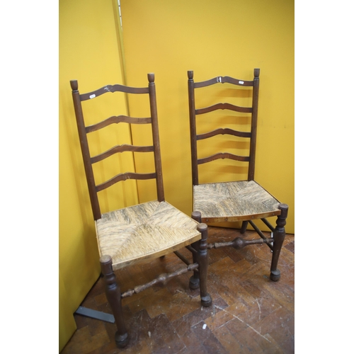 941 - Pair of Vintage ladder back chairs with rafia seating   See photos