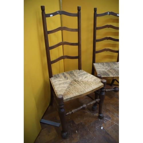 941 - Pair of Vintage ladder back chairs with rafia seating   See photos