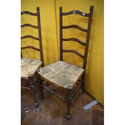 941 - Pair of Vintage ladder back chairs with rafia seating   See photos