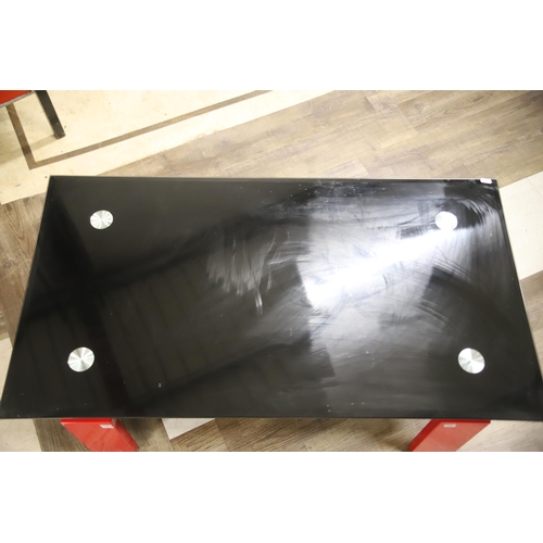 1247 - Stylish Modernist Low table of Glass and powder coated metal. H:17 x W:43  in excellent condition.  ... 