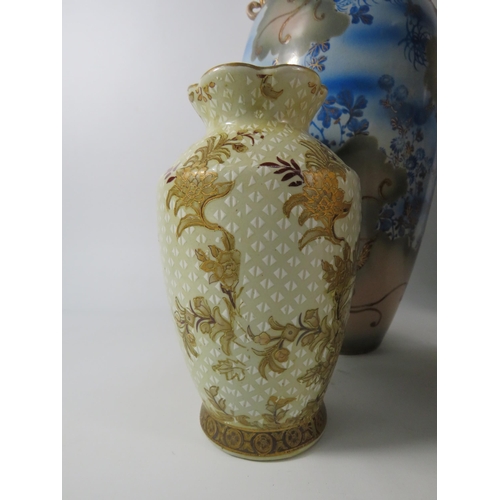 559 - Selection of Oriental vases,  the largest pair tand 17.5