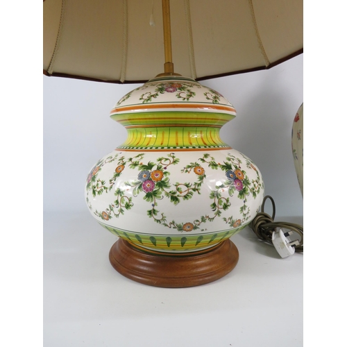 560 - Large Faience style table lamp with shade plus a large German lidded jar (repair to finial). The lam... 