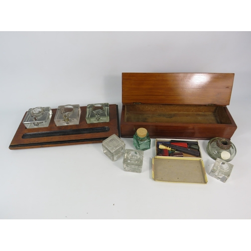 566 - Vintage inkwell pen rest desk tidy plus a wooden pen box and selection of various inkwells and a wax... 