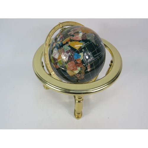 570 - Small semi precious stone world globe in brass gimbel with compass, approx 10