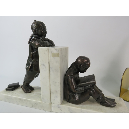 572 - Pair of Bronze figural marble bookends depicting chinese children students plus a single brass boat ... 