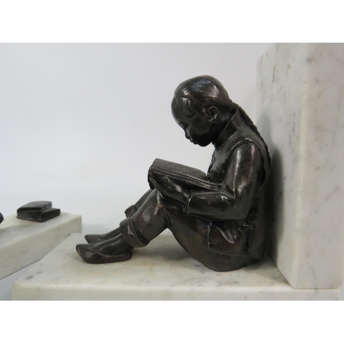 572 - Pair of Bronze figural marble bookends depicting chinese children students plus a single brass boat ... 