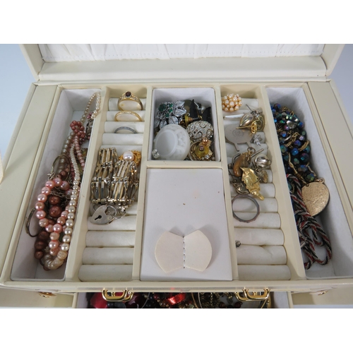 577 - Large Jewellery box and costume jewellery contents.