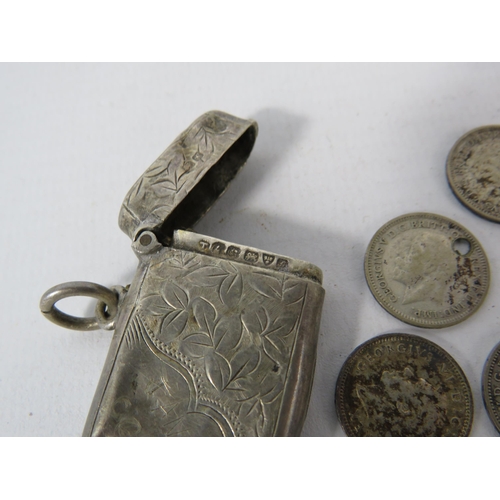 582 - 66.6 Grams of pre 1947 Silver coins plus a sterling silver vesta 12.1 grams.