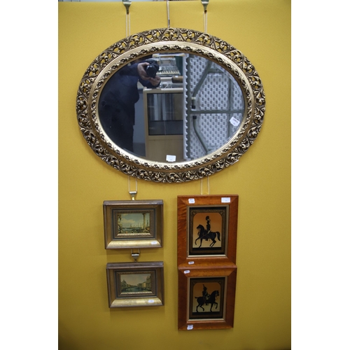 976 - Oval ornate framed mirror which measures 24 x 30 inches plus approx plus four small framed prints.  ... 