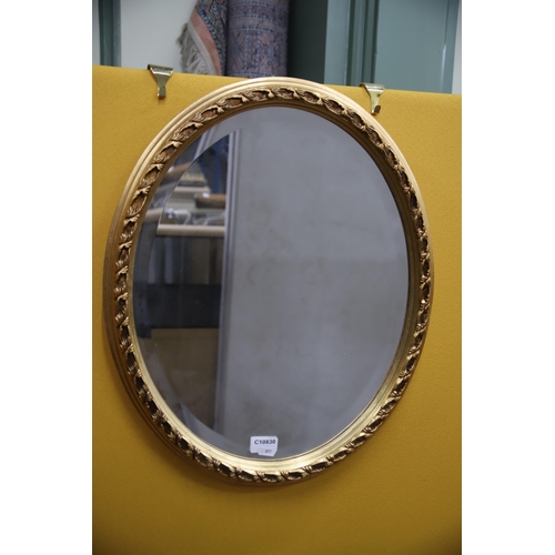 977 - Oval Framed mirror with bevelled glass 22 x 18 inches. plus a mirror glass artwork 32 x 48 inches.  ... 