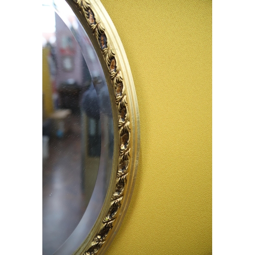 977 - Oval Framed mirror with bevelled glass 22 x 18 inches. plus a mirror glass artwork 32 x 48 inches.  ... 