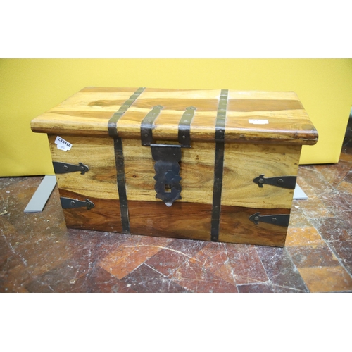 982 - Attractive Mango Wood Chest with exposed metal straps and clasp.  Measures approx 12 x 23 x 12 inche... 