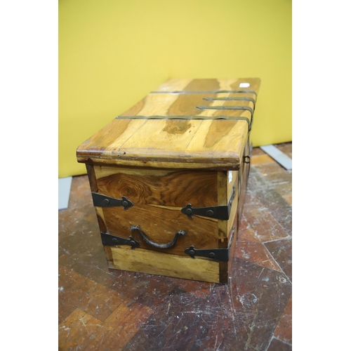 982 - Attractive Mango Wood Chest with exposed metal straps and clasp.  Measures approx 12 x 23 x 12 inche... 