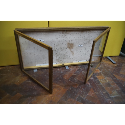 986 - Well made Oak Display cabinet with twin doors.  Measures approx 22 x 45 x 2.5  inches. In very good ... 