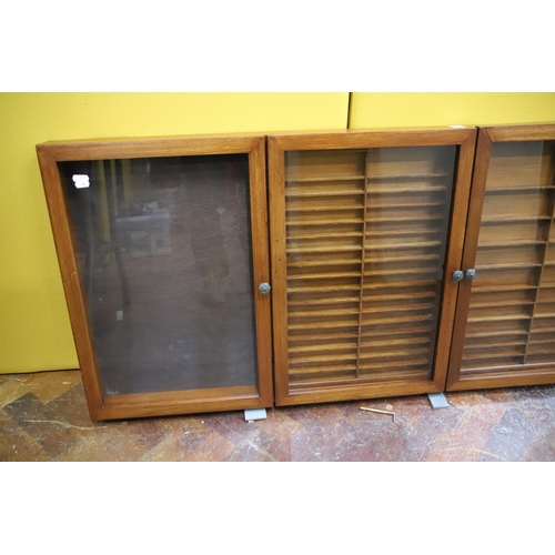 987 - Large Four door display cabinets with removeable floors.   24 x 66 x 2.5 inches. See photos..