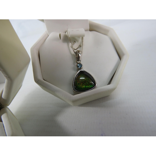 379 - Two Sterling silver Ammolite pendants with chains plus a sterling silver spoon & locket plus some co... 