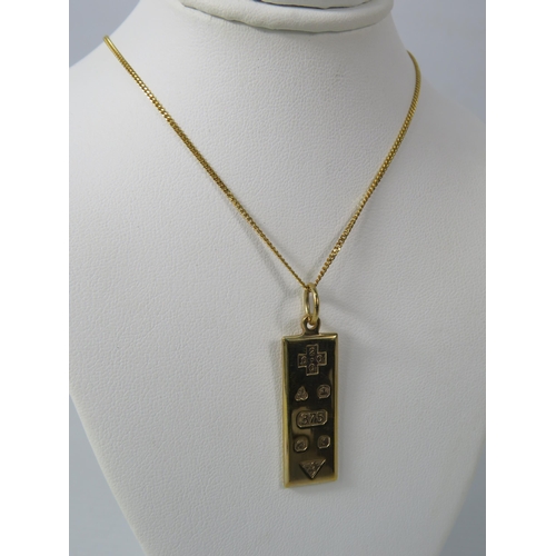 382 - 9ct Gold Millennium Ingot pendant with a 9ct gold 18