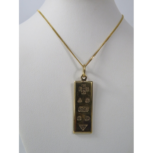 382 - 9ct Gold Millennium Ingot pendant with a 9ct gold 18