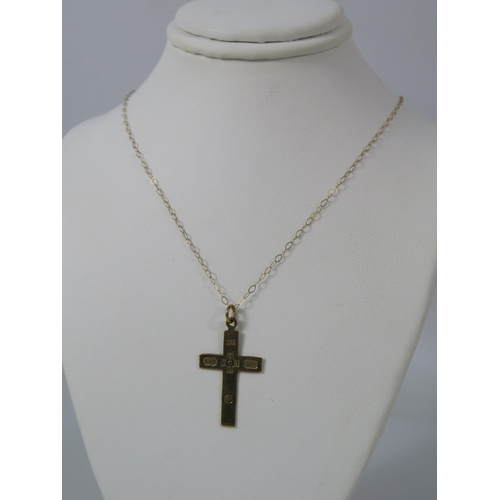 384 - 9ct Gold Millennium Crucifix pendant on a 18