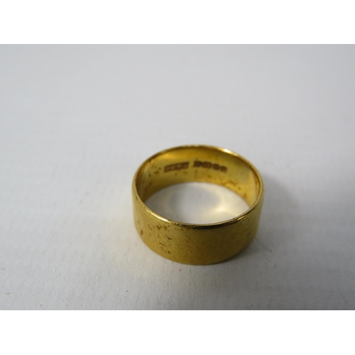 387 - 22ct gold wedding ring,  7mm wide Size M. 5.5 grams