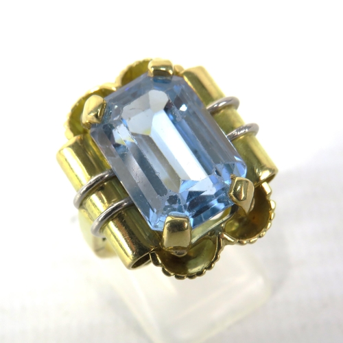 390 - 18ct Gold Statement ring set with a blue topaz 16mm by 10mm, finger size O. 15.7 grams