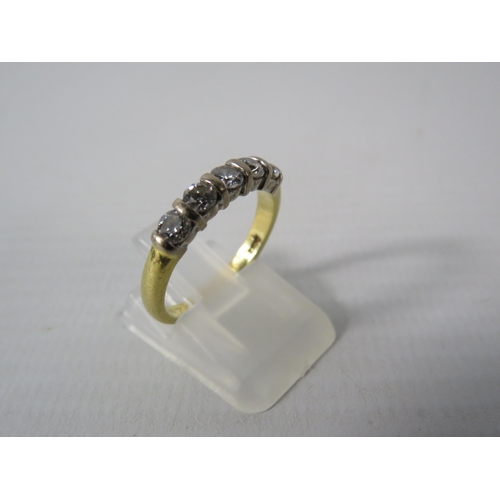 391 - 18ct Gold ring set with five 3mm diamonds, finger size M, 3.3 grams.