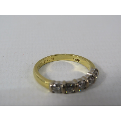 391 - 18ct Gold ring set with five 3mm diamonds, finger size M, 3.3 grams.