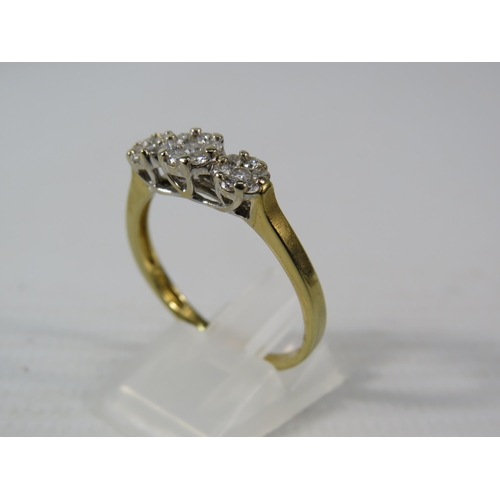 393 - 9ct Gold ring with 21 diamonds set in flower pattern, finger size V, 4.1 grams. (Hallmarks rubbed)