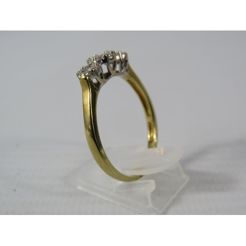 393 - 9ct Gold ring with 21 diamonds set in flower pattern, finger size V, 4.1 grams. (Hallmarks rubbed)