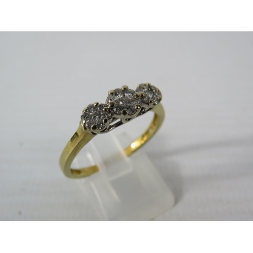 393 - 9ct Gold ring with 21 diamonds set in flower pattern, finger size V, 4.1 grams. (Hallmarks rubbed)