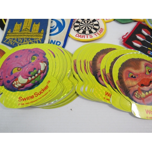 588 - Mixed lot to include Vintage beer mats, 1986 Madballs stickers, Material Patches etc.