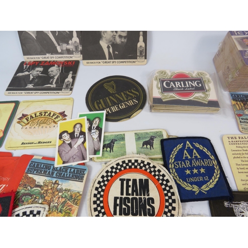 588 - Mixed lot to include Vintage beer mats, 1986 Madballs stickers, Material Patches etc.