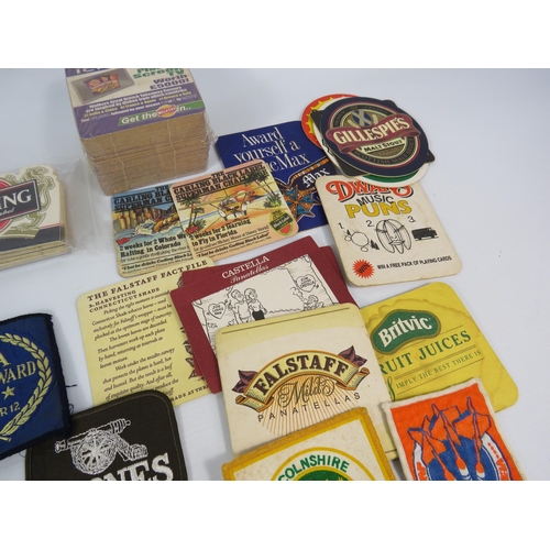 588 - Mixed lot to include Vintage beer mats, 1986 Madballs stickers, Material Patches etc.