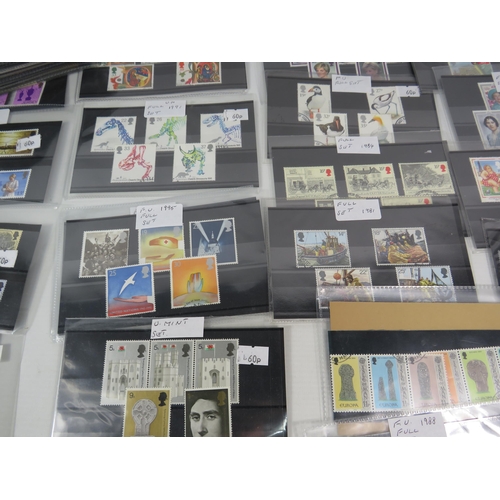 593 - Over 100 set of mainly mint stamps sets &  a large selection of unused postcards and Kensitas Cigare... 