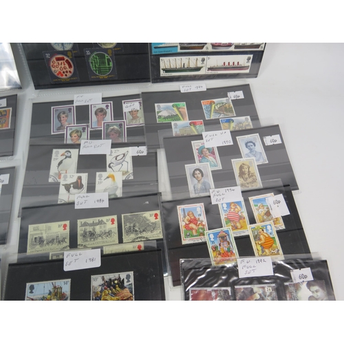 593 - Over 100 set of mainly mint stamps sets &  a large selection of unused postcards and Kensitas Cigare... 